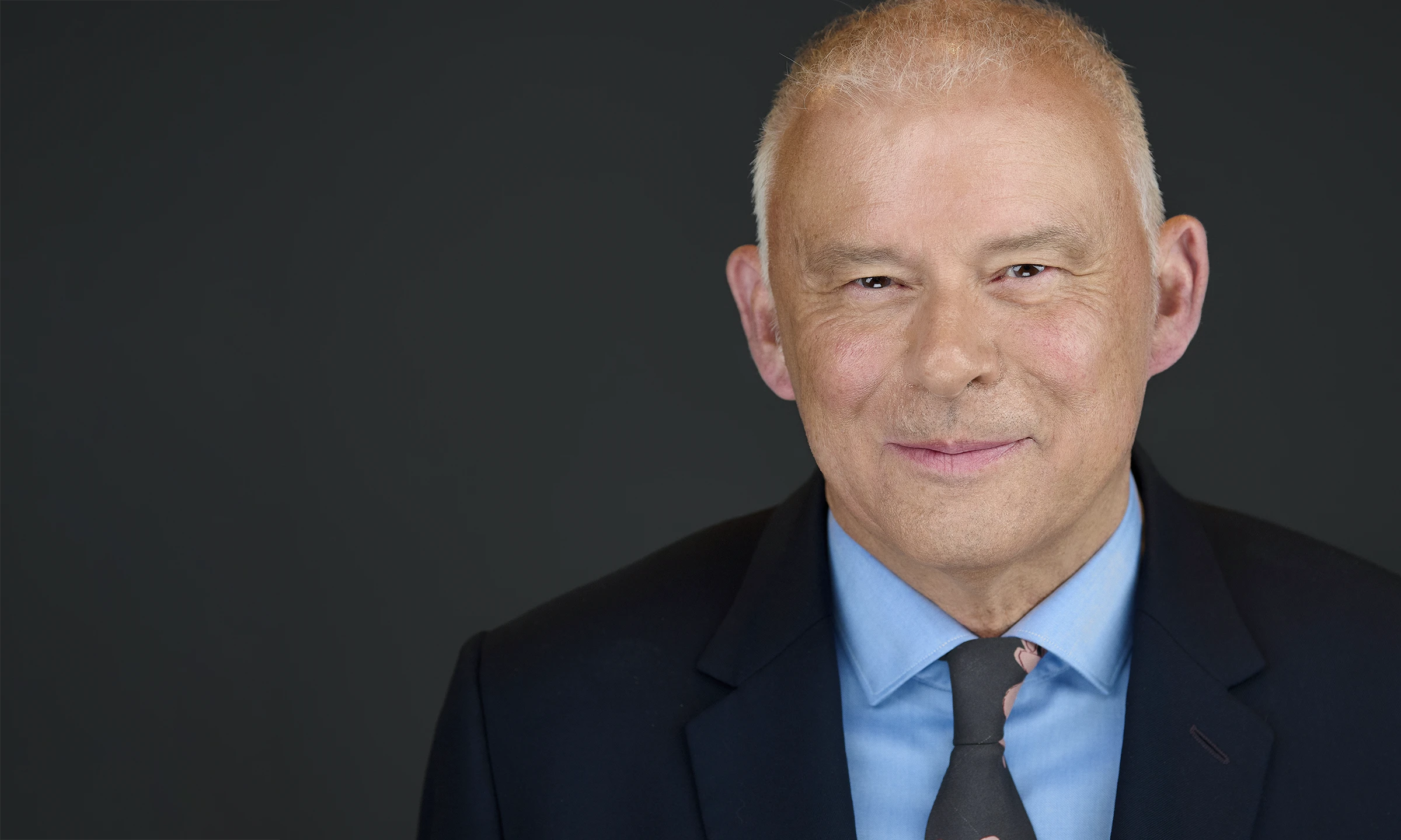 Corporate Headshots businessman in suit and blue shirt