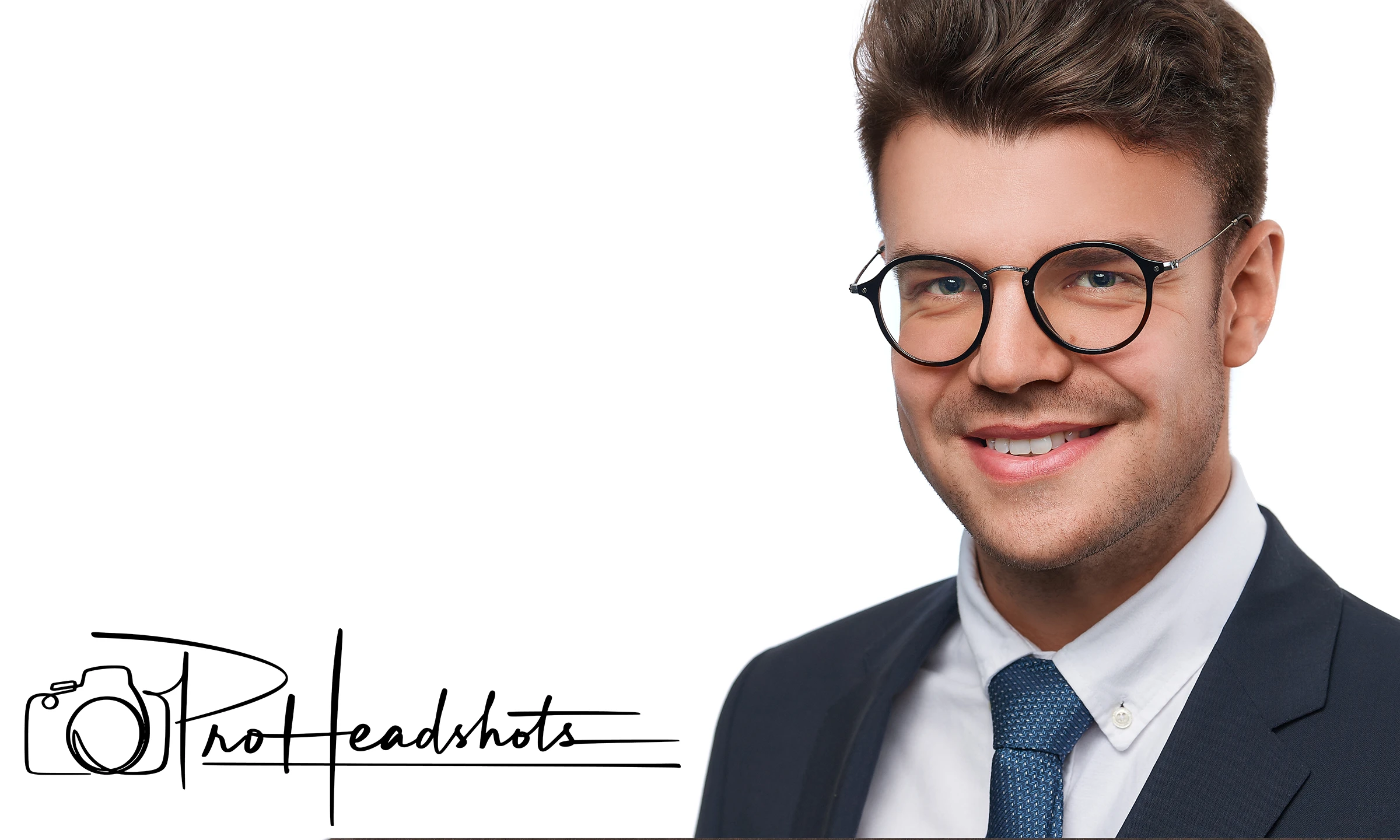 Head shot image of young businessman wearing a suit, tie and glasses