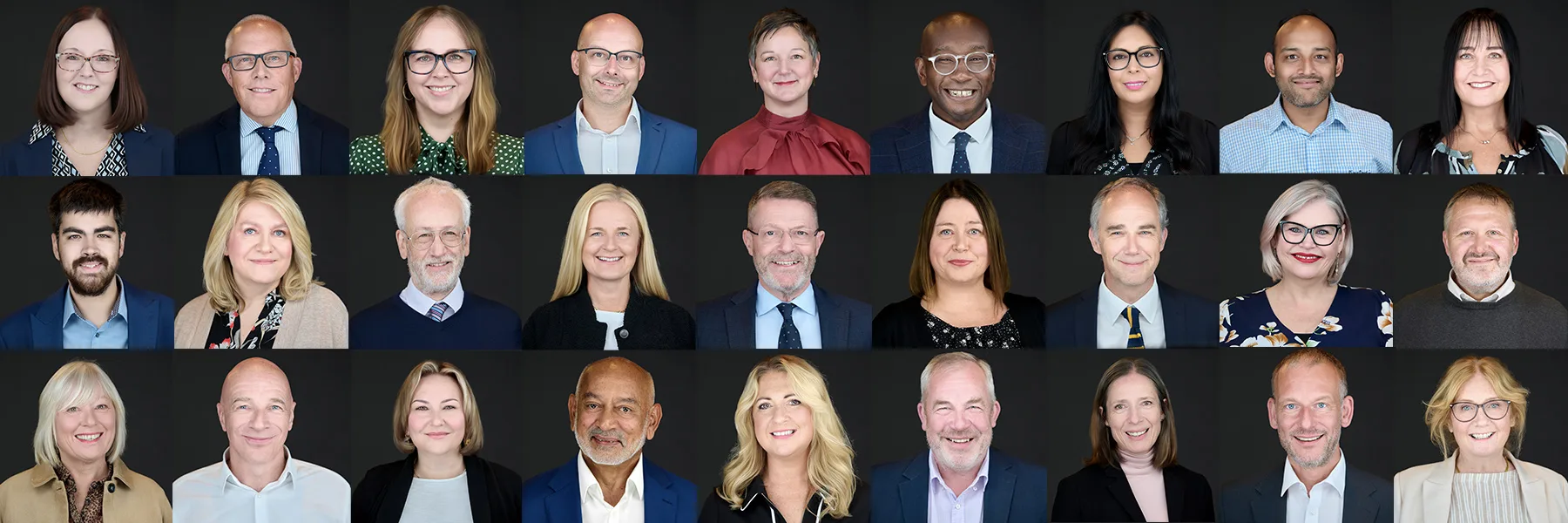 Grid of 24 professional corporate headshots showing consistent lighting, framing and confident expressions across the team