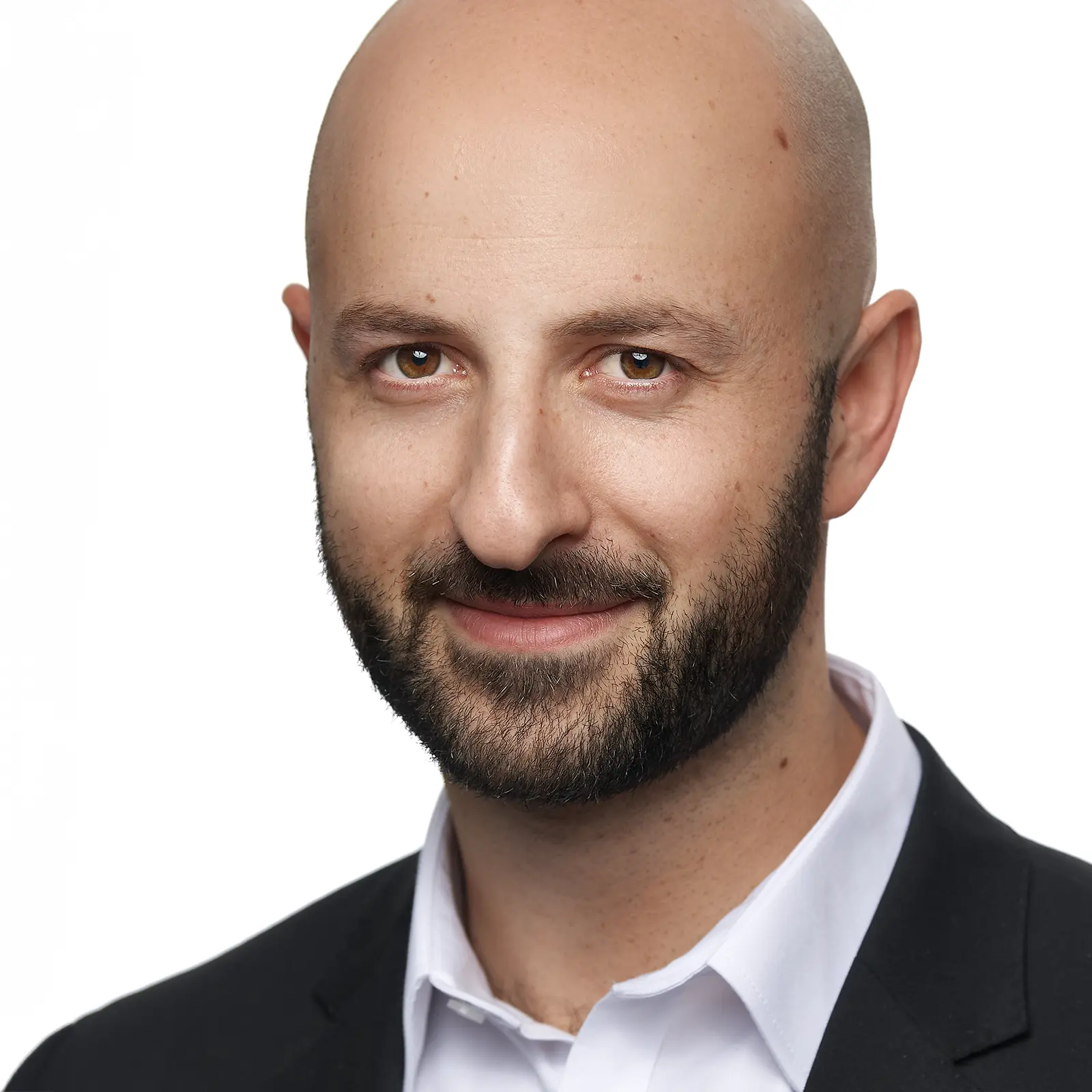 Professional business headshot of a man with a beard, bald head, and white background