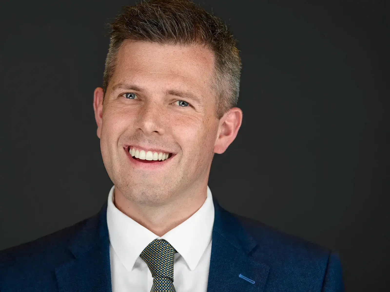 Capture Your Confidence with Plymouth Corporate Photography Relaxed headshot of Plymouth executive showing authentic expression and approachability