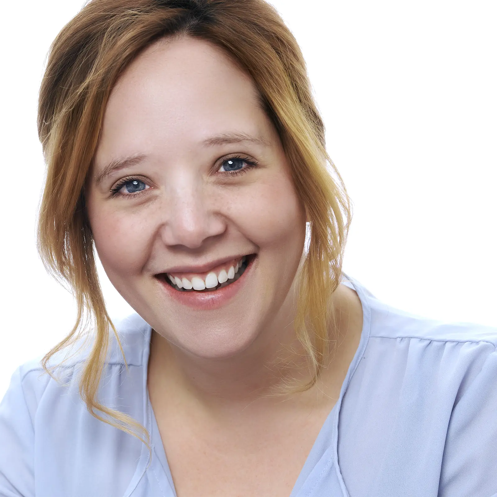 Professional business headshot of a happy and confident looking woman with a white background