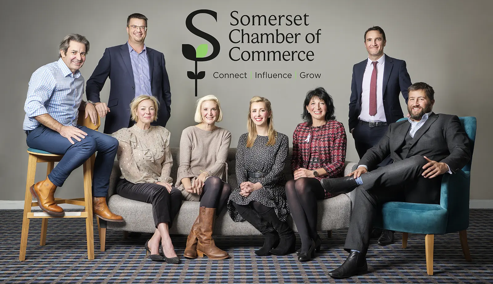 Team corporate headshots captured on location. Combined team image showing all members of the Somerset Chamber of Commerce captured at the workplace by headshot photographer Peter Nutkins