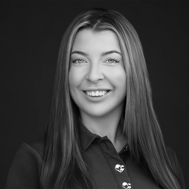 Natural, unposed expression captured during a professionally coached headshot session