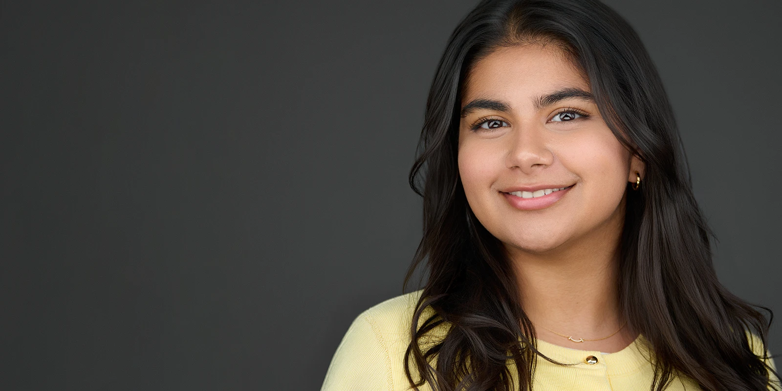 Professional looking calm and confident during a reassuring headshot photography session