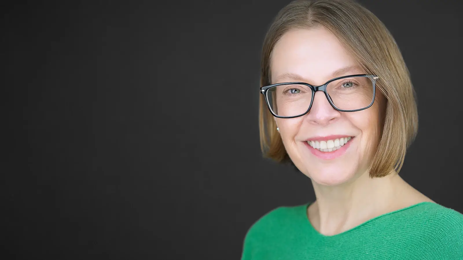 Professional portrait showing a confident, current business image ready for LinkedIn and web