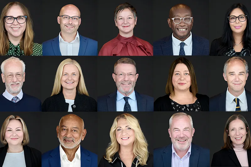 Grid of individual corporate headshots from multiple sessions, each person photographed to the same standard, same background, same framing